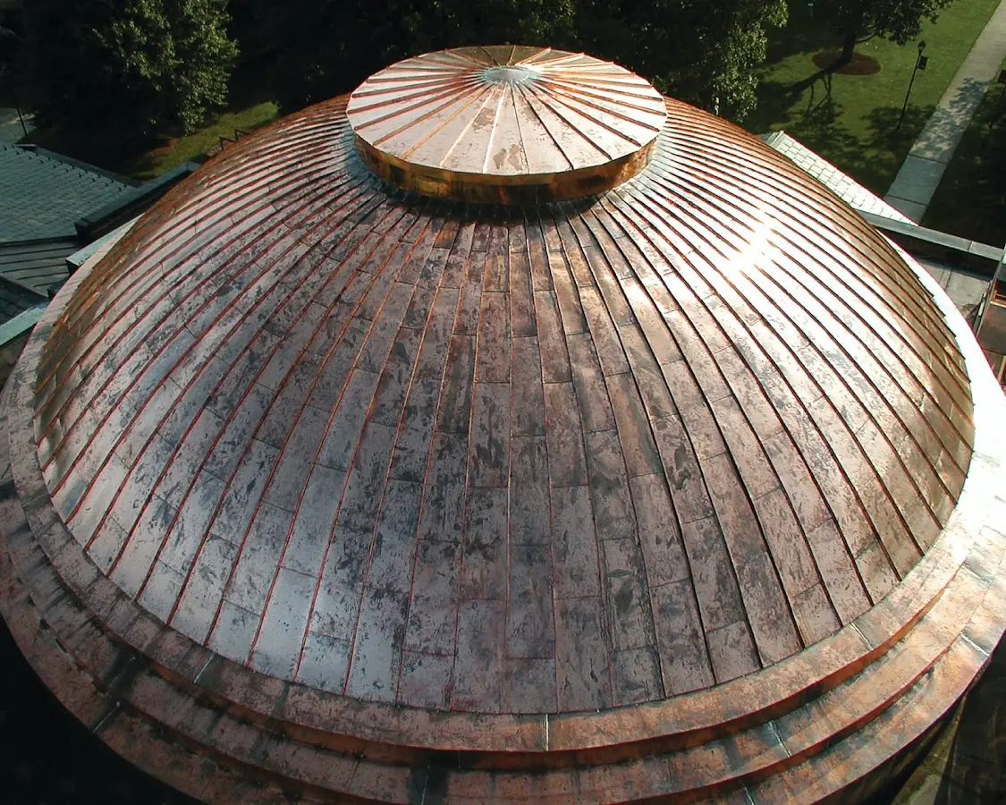 Craftsman Roofing crew installing a new roof in Country Club Manor